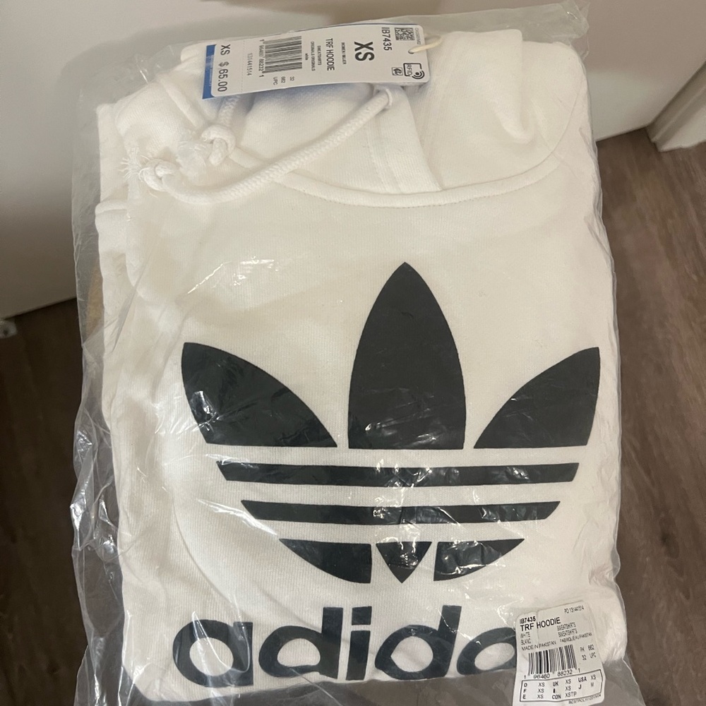 Brand new Adidas Hoodie. XS or Large Child. white and black.